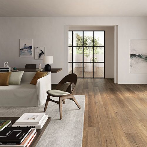 Ambiente living realizzato con pavimento della collezione W3, variante Burl coffee