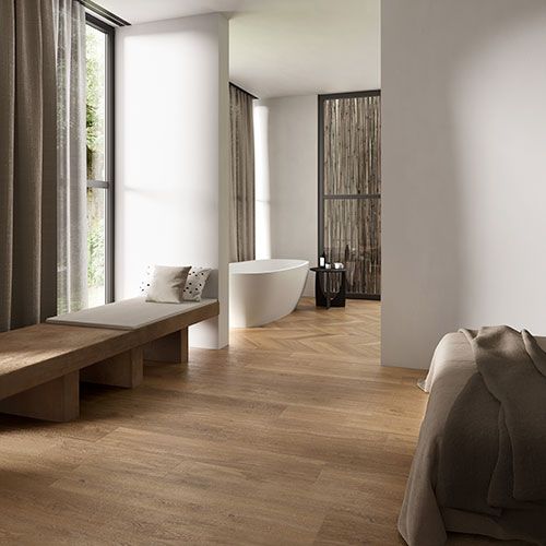 Ambiente realizzato con pavimento della collezione W3, variante Burl coffee