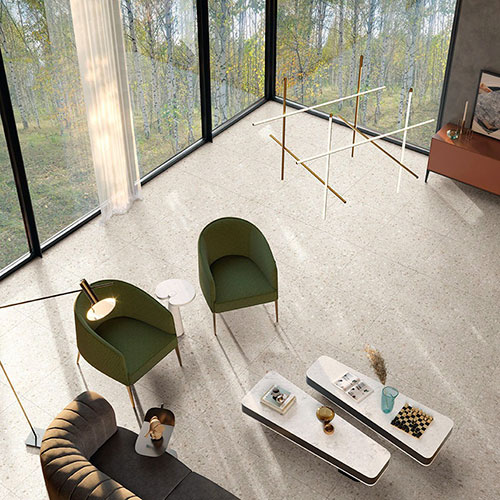 Ambiente living realizzato con pavimento della collezione LIM, variante White