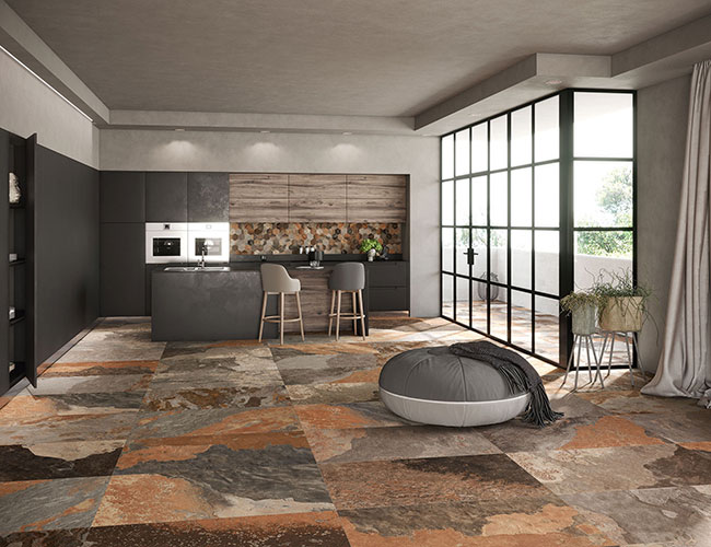 Ambiente living realizzato con Pavimento della collezione More, variante Sunset