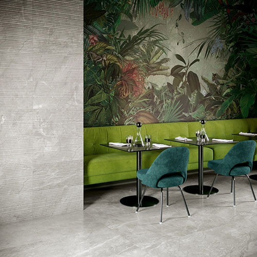 Ambiente pubblico realizzato con pavimento e rivestimento della collezione Velvet, variante Grey