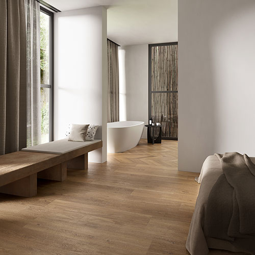 Ambiente realizzato con pavimento della collezione W3, variante Burl coffee