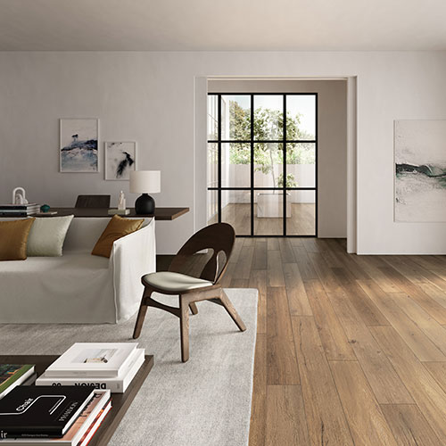 Ambiente living realizzato con pavimento della collezione W3, variante Burl coffee