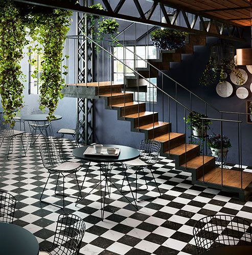immagine della serie Concert, colore Black: pavimento di locale pubblico bianco e nero, con scala in legno