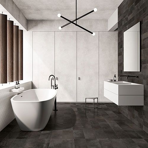 Ambiente bagno realizzato con rivestimento e pavimento variante Darkpeat, collezione Home effetto cotto