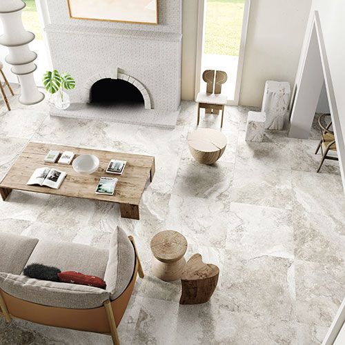 Immagine dall'alto del pavimento di un living in un moderno appartamento, serie Bloom colore Grey