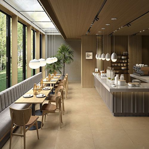 Ristorante realizzato con rivestimento e pavimento Miso - Ochre, collezione Iro