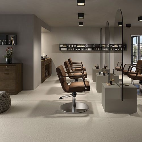 Barber shop realizzato con pavimento della Collezione Spring, variante Sand
