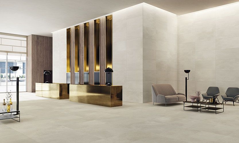 Reception di hotel con pavimento e rivestimento Ivory, serie Feel