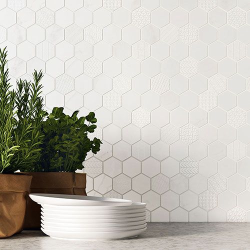 immagine della serie Concert, colore White, rivestimento esagona con alcune piante in primo piano