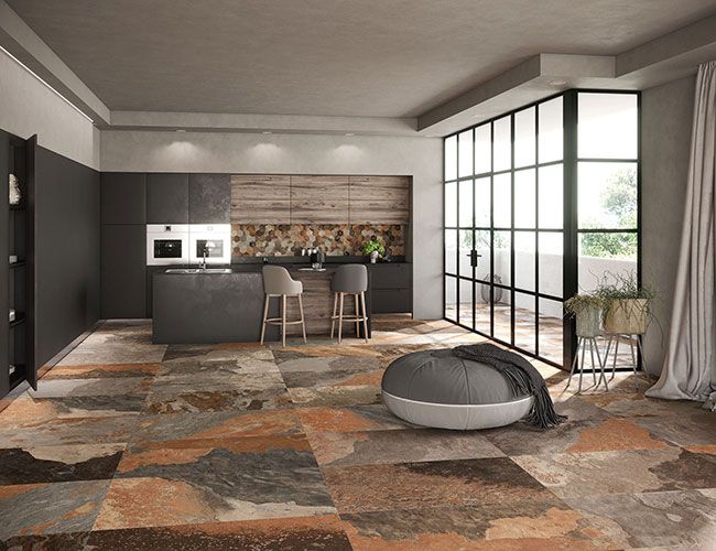 Ambiente living realizzato con Pavimento della collezione More, variante Sunset