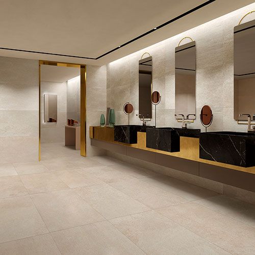 ambiente pubblico: servizi con pavimento e rivestimento Ivory, serie Feel